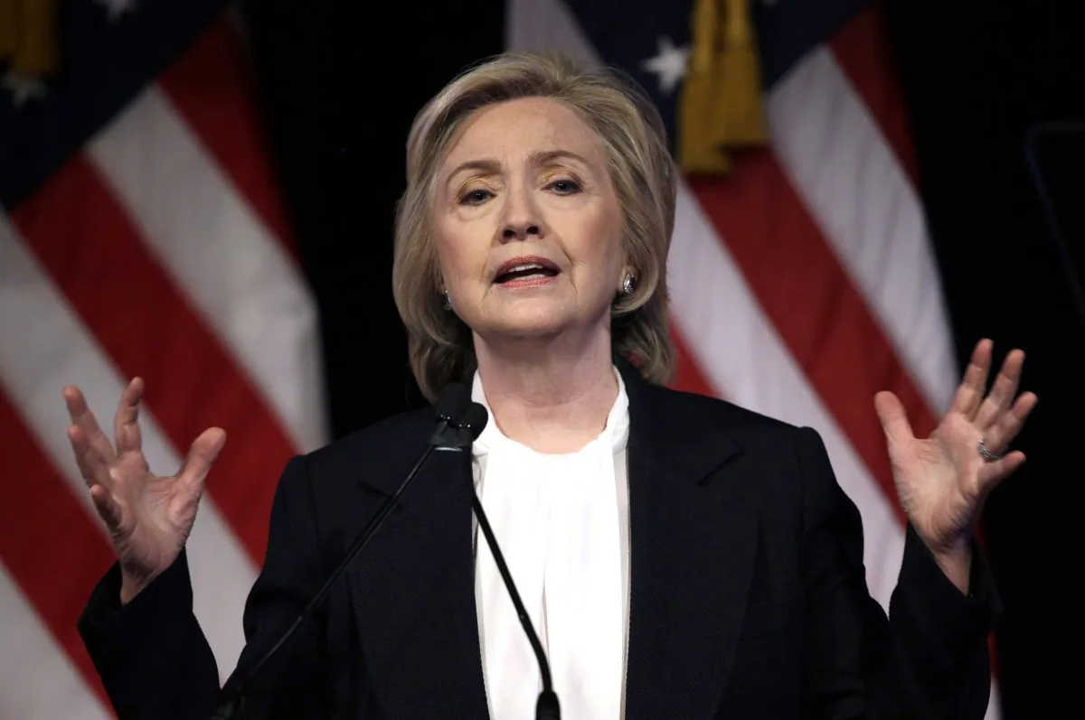 In this July 13, 2015, file photo, Democratic presidential candidate Hillary Rodham Clinton speaks at a campaign event in New York.  Federal officials say two government inspectors general have asked the Justice Department to determine whether sensitive government information was transmitted on Hillary Rodham Clinton's personal email.  (AP Photo/Seth Wenig)