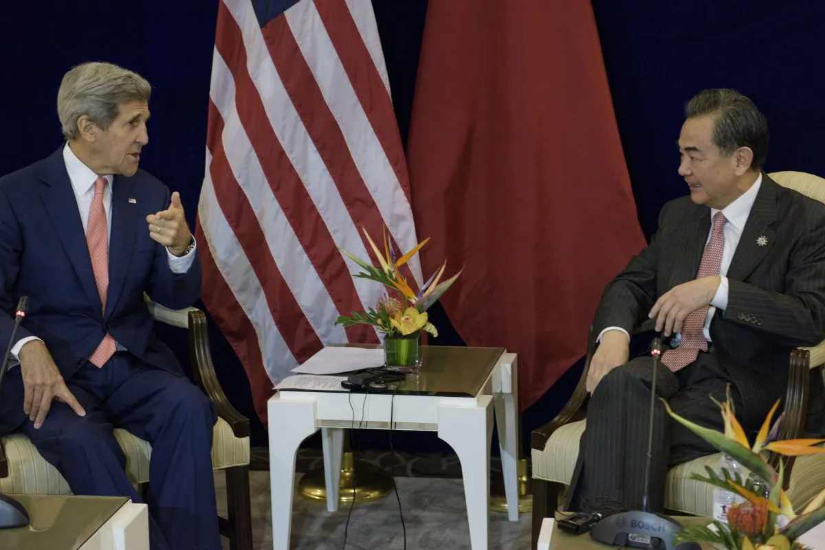 U.S. Secretary of State John Kerry (L) and China's Foreign Minister Wang Yi before a bilateral meeting at the Putra World Trade Center in Kuala Lumpur, Malaysia, on Wednesday, Aug. 5, 2015. (Brendan Smialowski/AFP/Getty Images)