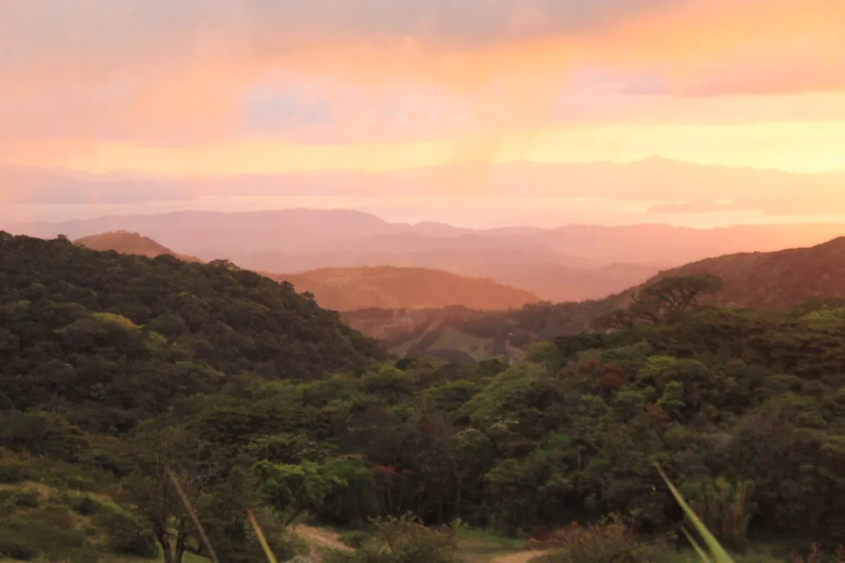 Sunset at Monteverde. Due to its high altitude, Monteverde receives a steady supply of clouds whose moisture helps support an extensive rainforest ecosystem.(Wibke Carter)