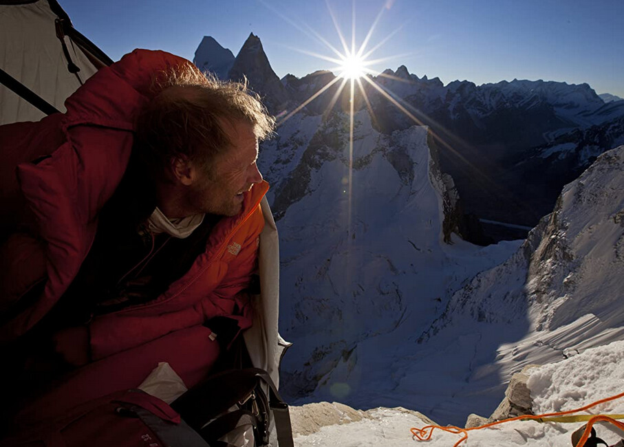 man looks out at mountain in Meru