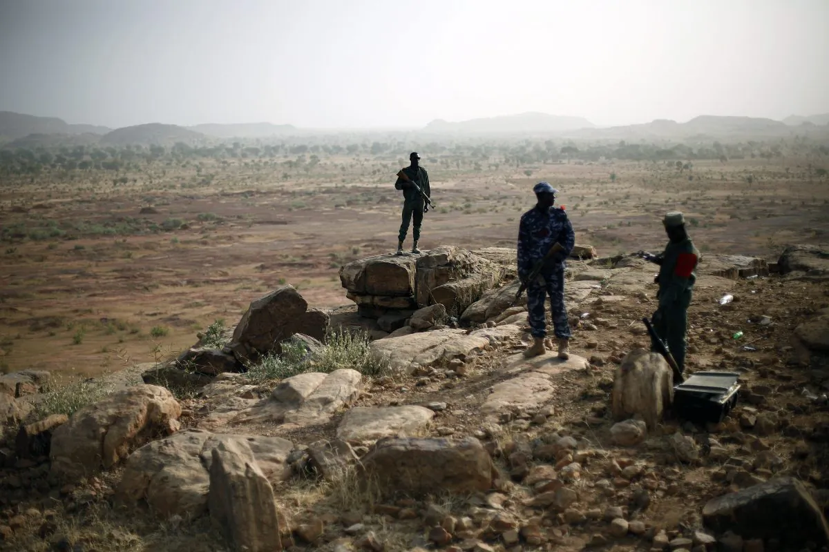 Malian troops man an observation post outside Sevare, some 620 kms (400 miles)  north of Mali's capital  Bamako Thursday, Jan. 24, 2013. (AP Photo/Jerome Delay)
