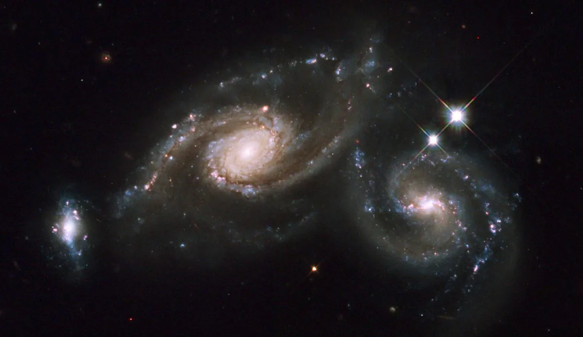 "Theoretically we thought that when the universe was only 5 percent of its present age, it would be a place full of chaos and disorder," Rupert Croft says. "Our simulation showed that the early universe might be far from being just this. It might contain beautiful symmetrical galaxies, like the Milky Way." (Hubble Heritage/CC BY-SA 2.0)