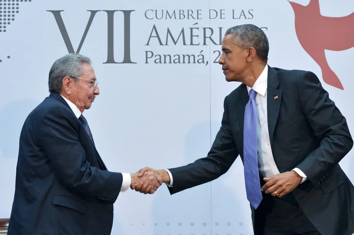 President Barack Obama (R) shakes hands with Cuban Dictator Raul Castro (L) during the Summit of the Americas at the ATLAPA Convention Center, in Panama City, on April 11, 2015. (Mandel Ngan/AFP/Getty Images)