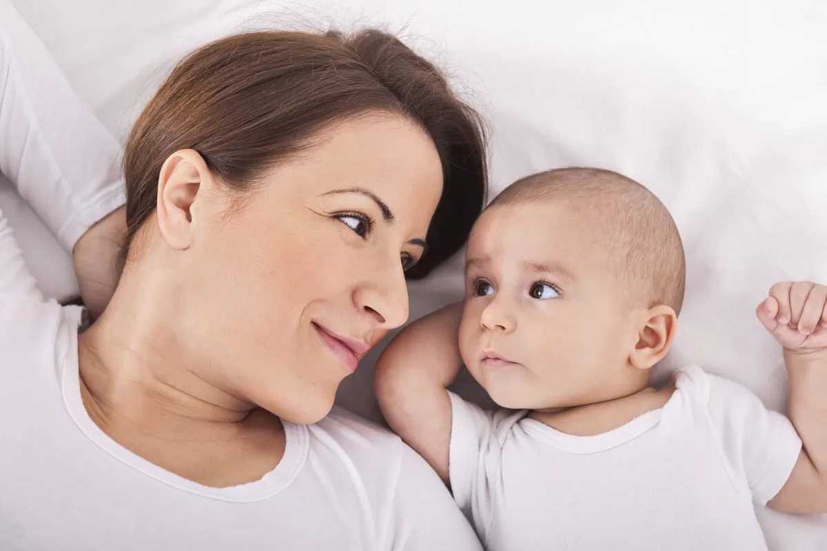 "Babies learn best from people," says Rechele Brooks. "During playtime your child is learning so much from you. Spending time with your child matters. Keeping them engaged—that's what helps them learn language." (didesign021/iStock)