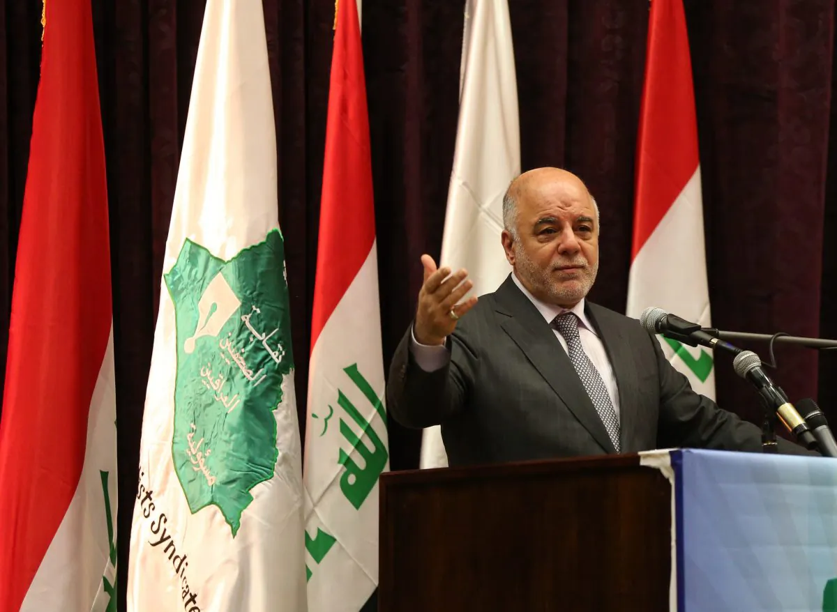 In this Saturday, June 27, 2015 file photo, Iraqi Prime Minister Haider al-Abadi announces the arrest of Abdel Baqi al-Sadun, a senior official in the disbanded Baath Party, during a press conference in Baghdad, Iraq. (AP Photo/Karim Kadim)