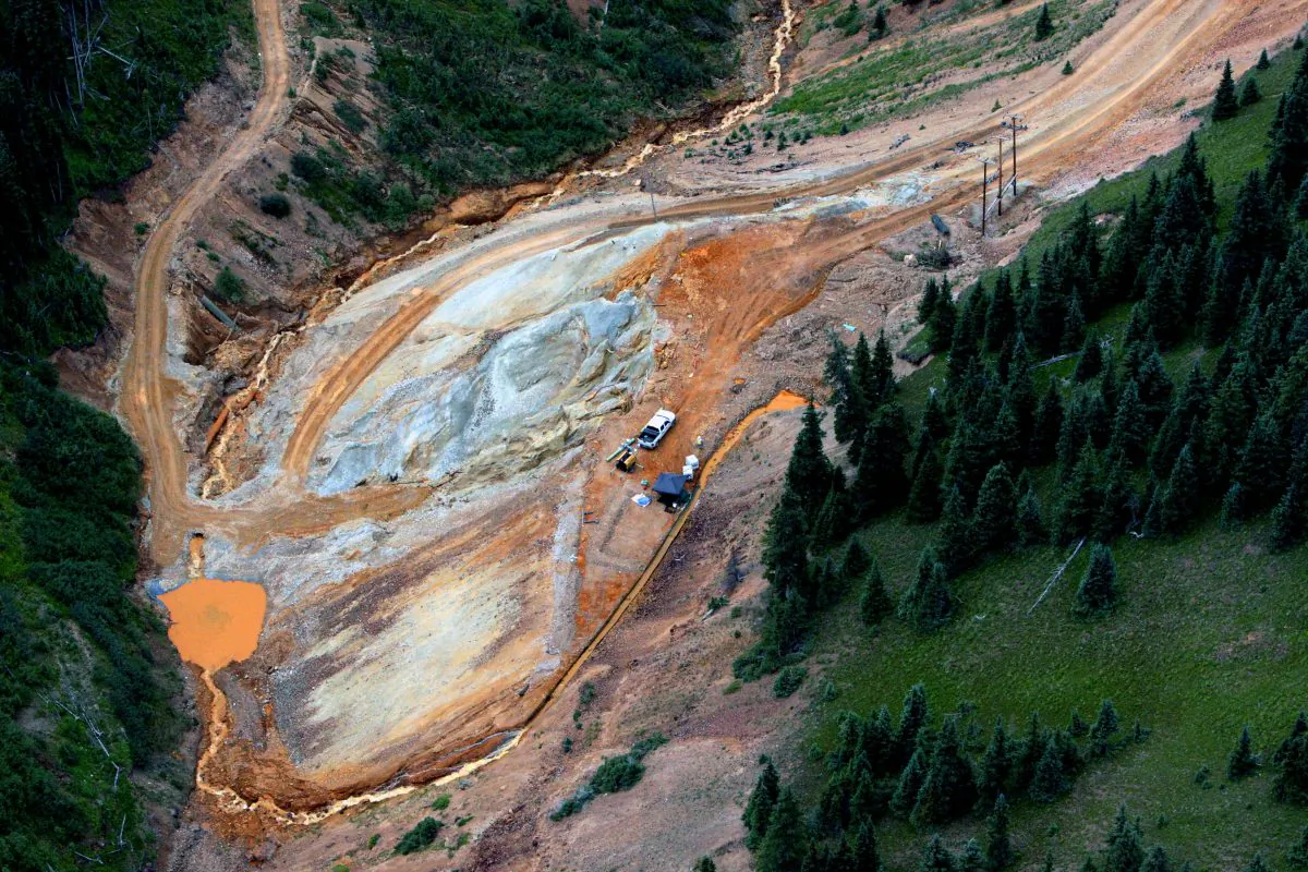 Waste water continues to stream out of the Gold King Mine near Silverton, Colo., on Tuesday, Aug. 11, 2015. (Geoff Liesik/The Deseret News via AP)
