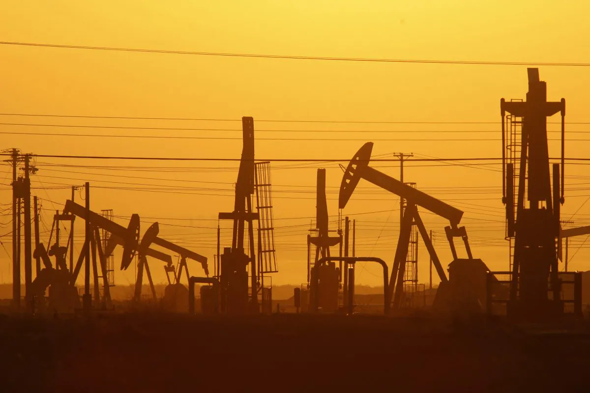 Pump jacks in an oil field over the Monterey Shale formation where gas and oil extraction using hydraulic fracturing, or fracking, near Lost Hills, Calif., on March 24, 2014. (David McNew/Getty Images)