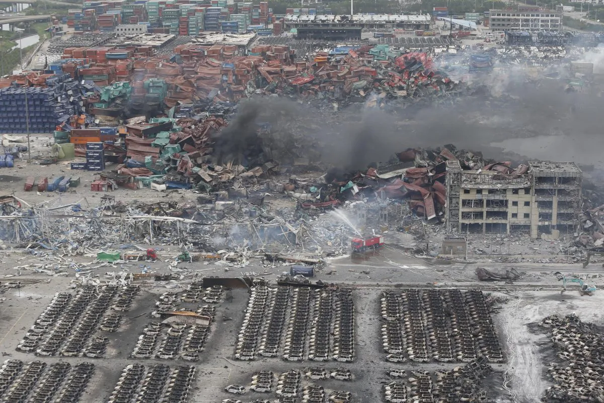 Rescuers work at the site of the explosions in Tianjin on Aug. 14, 2015. (STR/AFP/Getty Images)