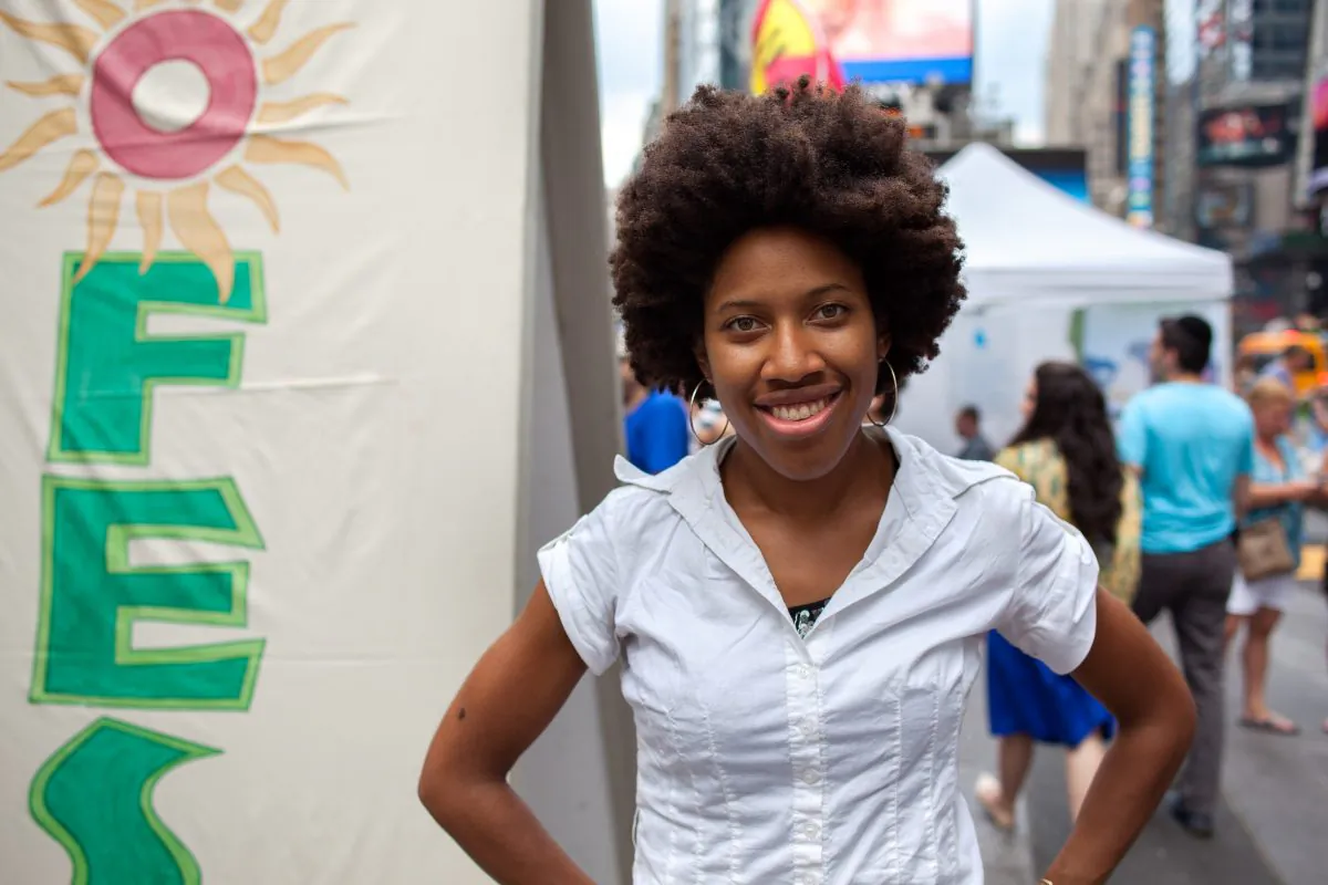 Singer Olivia Harris, aka Olivia K, at the EcoFest in Times Square, New York, on Aug. 16, 2015. (Petr Svab/Epoch Times)