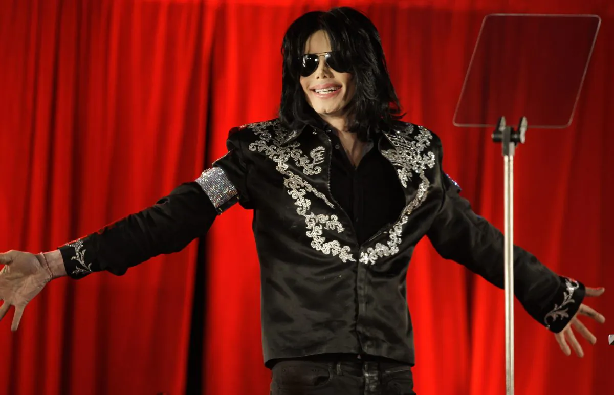 In this March 5, 2009 file photo, singer Michael Jackson announces that he is set to play ten live concerts in London. (AP Photo/Joel Ryan, File)