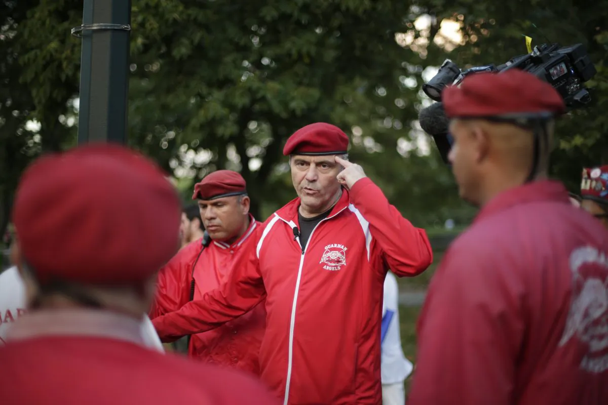 Curtis Sliwa speaks to members of the Guardian Angles in Central Park,  Aug. 12, 2015, in New York. (Frank Franklin II/AP)