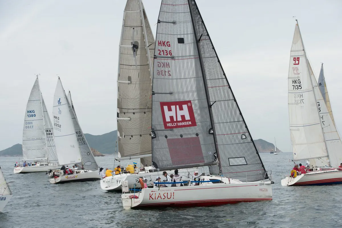 HKPN Division-A and J80 boats set off from Port Shelter on the penultimate race of the Quest Yachting Typhoon Series 2015 on Sunday August 16, 2015. (Bill Cox/Epoch Times)