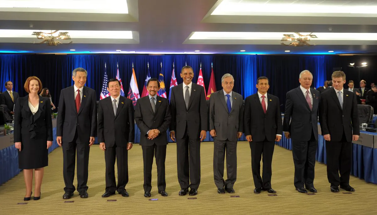 President Barack Obama (C) and Trans-Pacific Partnership leaders at the Asia-Pacific Economic Cooperation (APEC) Summit in Honolulu, Hawaii, on Nov. 12, 2011. (L-R) Australian Prime Minister Julia Gillard, Singapore Prime Minister Lee Hsien Loong, Vietnamese President Truong Tan Sang, Brunei's Sultan Hassanal Bolkiah, Obama, Chilean President Sebastián Piñera, Peruvian President Ollanta Humala, Malaysian Prime Minister Najib Razak and New Zealand Deputy Prime Minister Bill English. (Saul Loeb/AFP/Getty Images)