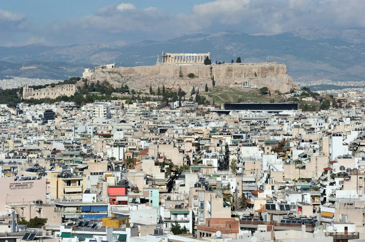 A view of Greece’s capital, Athens, with the acropolis hill in the background, on Nov. 28, 2013. (Louisa Gouliamaki/AFP/Getty Images)