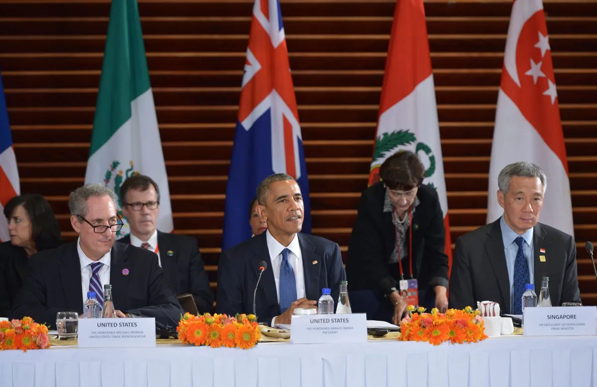 President Barack Obama (C) at a meeting with leaders from the Trans-Pacific Partnership at the U.S. Embassy in Beijing on Nov. 10, 2014. (L-R) U.S. Trade Representative Mike Froman, Obama, and Singapore Prime Minister Lee Hsien Loong. (Mandel Ngan/AFP/Getty Images)