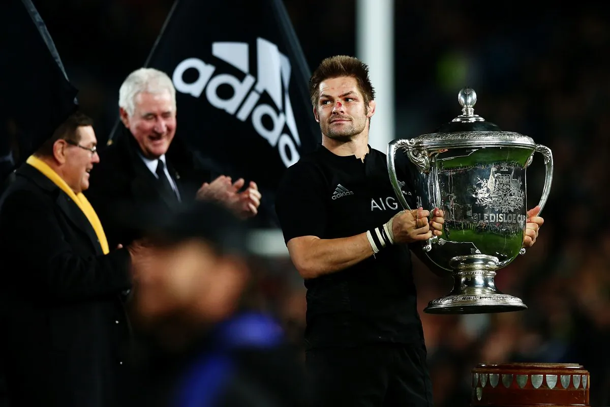 Richie McCaw of New Zealand receives the Bledisloe Cup after winning The Rugby Championship, Bledisloe Cup match between the New Zealand All Blacks and the Australian Wallabies at Eden Park on August 15, 2015 in Auckland, New Zealand. (Anthony Au-Yeung/Getty Images)