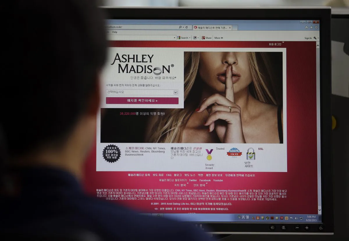 A June 10, 2015 photo from files showing Ashley Madison's Korean web site on a computer screen in Seoul, South Korea. (AP Photo/Lee Jin-man)