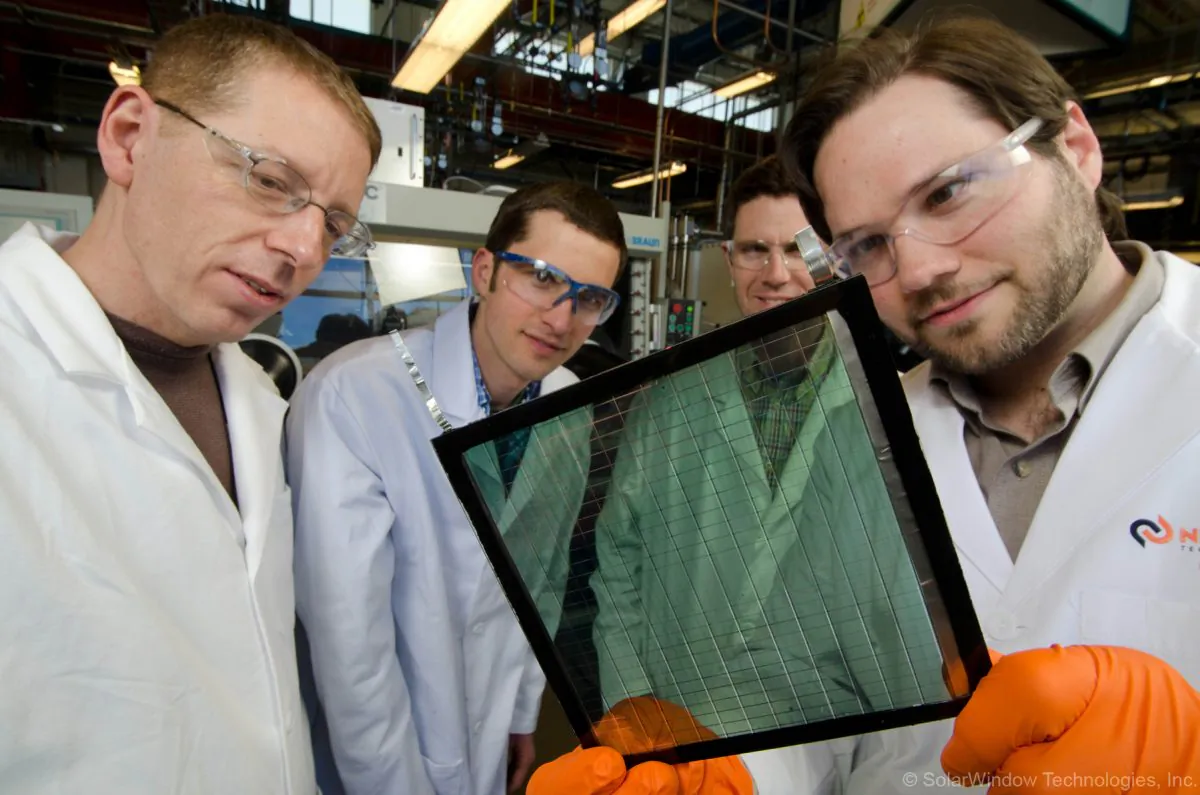 Scott Hammond (R) principal scientist at Solar Window Technologies, Inc. with the team at NREL. (Courtesy of Solar Window Technologies, Inc.)