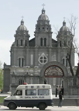 Beijing Church Leader Put on Trial; Relatives and US Embassy Official Blocked