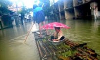 China Reels from Cyclone, Floods, Quake