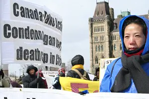STANDING ON GUARD: The Sujiatun concentration camp, implicated in China's state-run organ trade and in the systematic killing of Falun Gong practitioners, has prompted demonstrators to call for Western governments to intervene. (Matthew Hildebrand/The Epoch Times)