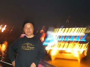 Gao Zhisheng in a ferry leaving Chongqing City (Ma Wendu)