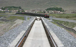 On June 25, a fleet of Chinese Communist Party military trucks drove alongside the Qinghai-Tibet Railway and headed for Tibet's capital, Lhasa. （Cancan Chu/Getty Images）