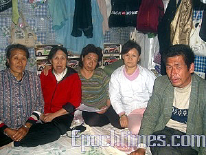 On the morning of October 11, 2007, several petitioners from Northeastern China, hid in a room to avoid arrest. (The Epoch Times)