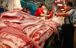 The recent steady increase in the price of pork has led to social turmoil in mainland China. (Teh Eng Koon/AFP/Getty Images)