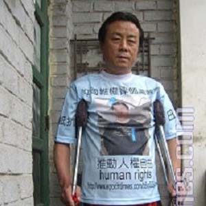 Renowned Chinese rights activist Qi Zhiyong was shot and disabled during Tiananmen Square Massacre in 1989. (The Epoch Times)