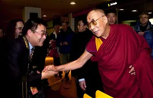 FRIENDLY FACE: His Holiness the Dalai Lama greeted Nick Wang in Mongolian when he discovered Nick hails from Inner Mongolia, China. The Dalai Lama visited New Zealand in June.  (Cameron Burnell Photography/Wellingtonian)