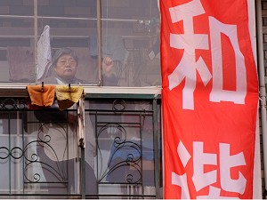 This banner outside an apartment building in the Minhang district of Shanghai protests against the new Maglev train line that will pass within 50 metres of the building. (Mark Ralston/AFP/Getty Images)
