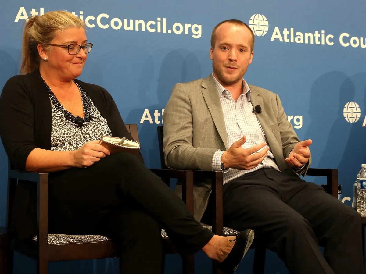 Catherine Lotrionte (l), director, Institute for Law, Science, and Global Security, Georgetown University and Robert Knake, fellow, Council on Foreign Relations. They discussed the cyberattack on OPM at the Atlantic Council, Aug. 19. (Gary Feuerberg/ Epoch Times)