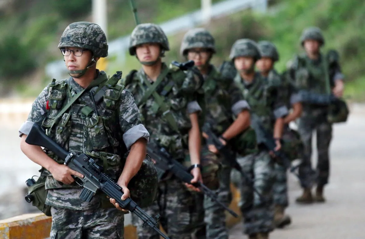 South Korean marines patrol along on Yeonpyeong island, South Korea, on Aug. 23, 2015. (Yun Tae-hyun/Yonhap via AP)