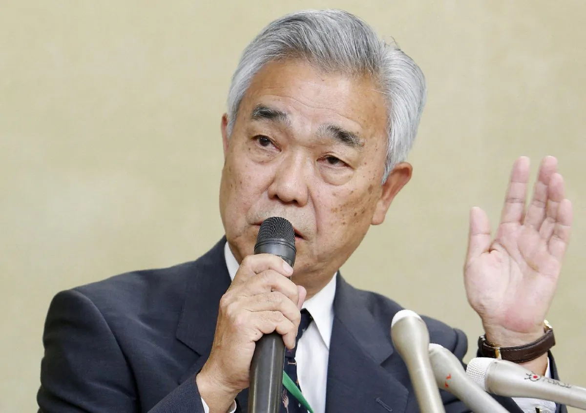 Japan Pension Service head Toichiro Mizushima during a press conference at the Welfare Ministry in Tokyo on June 1, 2015. Japan's pension service said on June 1 it suffered a hack attack that led to 1.25 million cases of personal data being leaked. (JIJI PRESS/AFP/Getty Images)