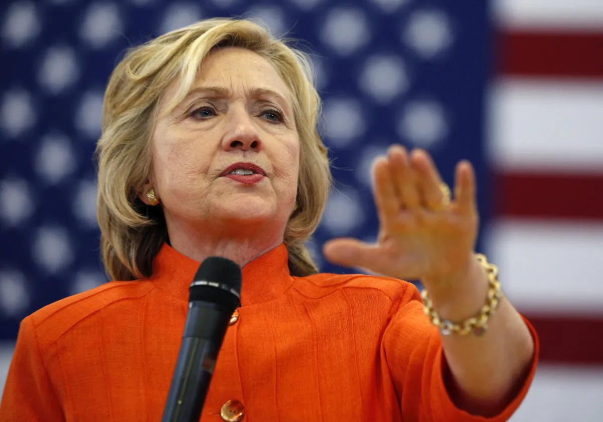 In this photo taken Aug. 18, 2015, Democratic presidential candidate Hillary Rodham Clinton speaks in North Las Vegas, Nev. Nearly six months out from the first votes of a presidential campaign, candidates should be fleshing out who they are and what they stand for. Instead, some of the best-known 2016 candidates are toting around heavy baggage that’s proving to be a big distraction from the conversations they’d rather be having with the American people. (AP Photo/John Locher)