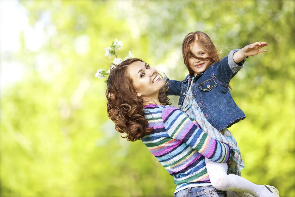 After a hard day at work, children still expect their mom to spend quality time with them. (FotoimperiyA/iStock)