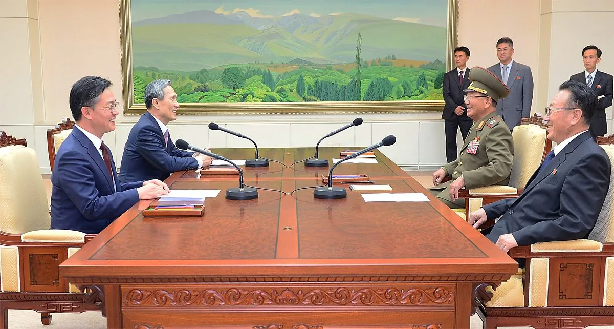 Senior North Korean official responsible for South Korean affairs, South Korean presidential security adviser, North Korea' top political officer for the Korean People's Army and South Korean Unification Minister talks after their meeting at the Panmunjom on August 25, 2015 in Paju, South Korea. (South Korean Unification Ministry via Getty Images)