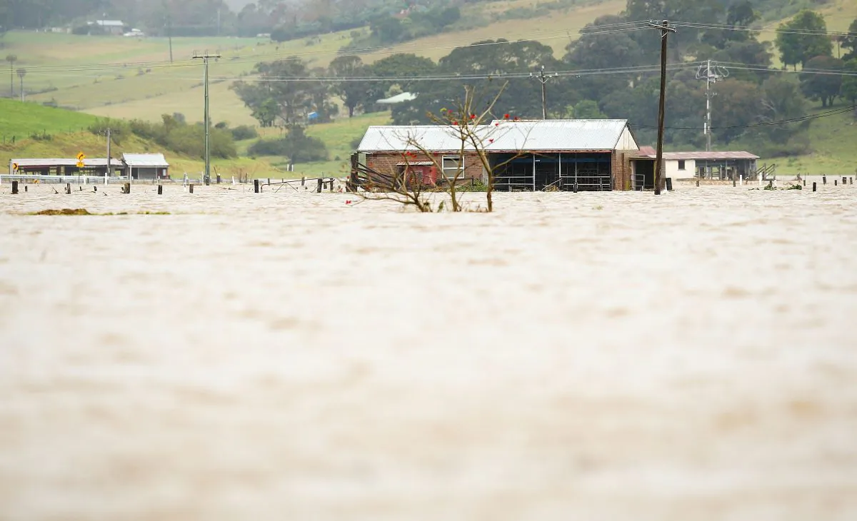 The Minumurra River floods farm land in Jamberoo on Aug. 25, 2015, in Jamberoo, Australia. Residents downstream of the Jerrara dam which feeds into the river have been evacuated following the flooding of Jerrara dam. (Mark Nolan/Getty Images)
