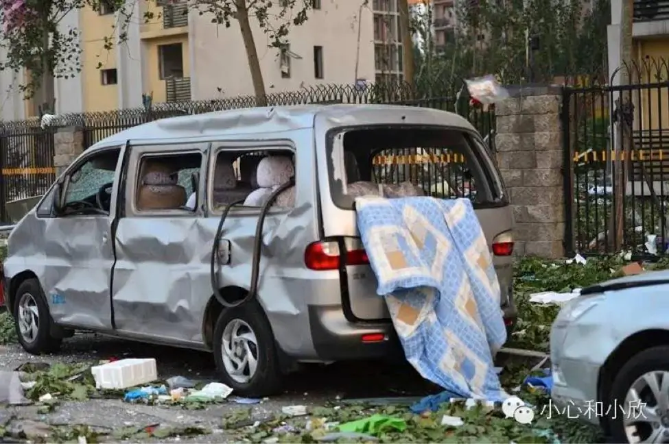 A damaged car near the explosions site in Tianjin, China, on Aug. 13, 2015, captured by a journalist sneaking past the police blockade. (He Xiaoxin/WeChat)