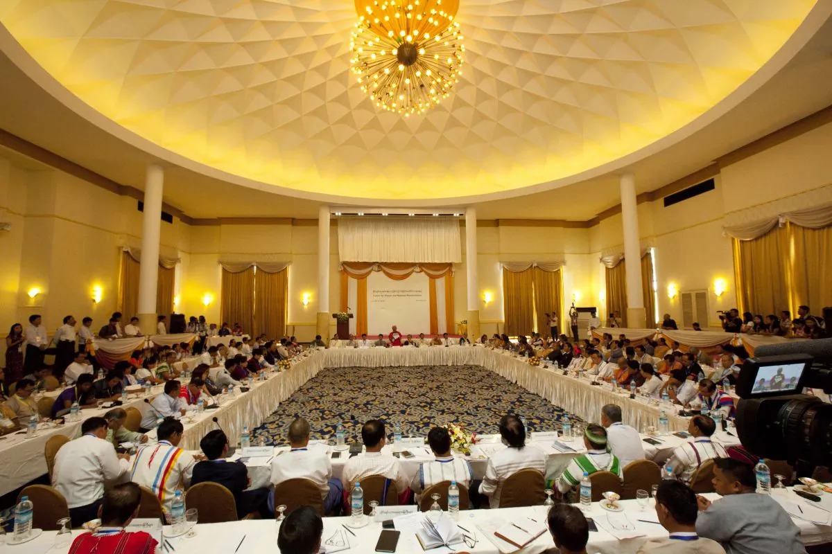 Gen. Mutu Say Poe (C), representative of the Karen National Union (KNU), speaks during a peace forum at a hotel in Yangon, Burma, on May 9, 2015. (Khin Maung Win/AP)