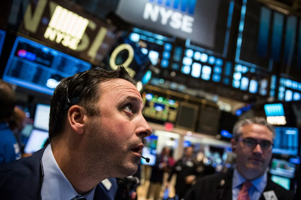 Traders work on the floor of the New York Stock Exchange on Aug. 26, 2015. (Andrew Burton/Getty Images)