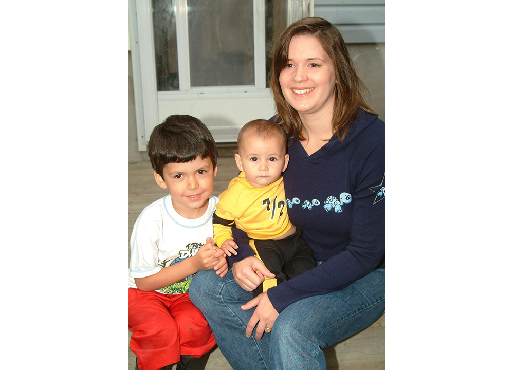 Stacey Mathias-Greer of Sudbury, Ont., has chosen not to have her sons Satya and Darshan immunized. The Canadian Medical Association is calling for parents to provide proof to school officials that their children have been vaccinated. (CP PHOTO/Gino Donato)