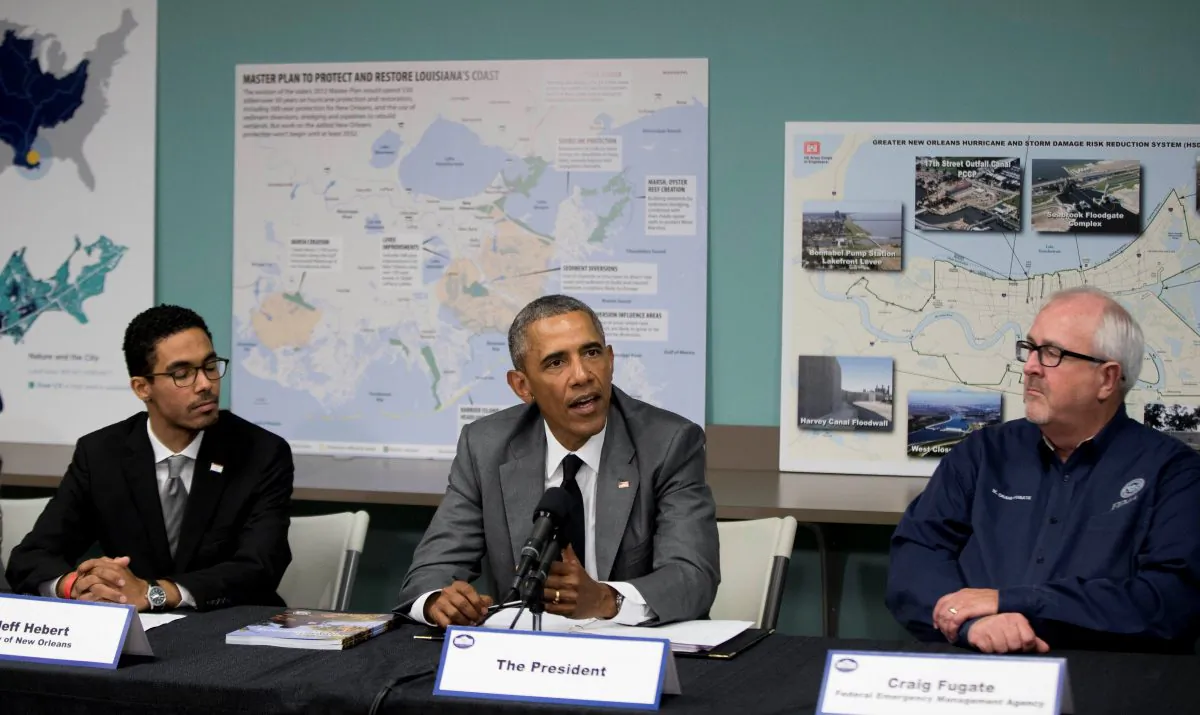 President Barack Obama participates in a roundtable on Hurricane Katrina at the Andrew P. Sanchez Community Center in New Orleans on Thursday, Aug. 27, 2015. (AP Photo/Andrew Harnik)