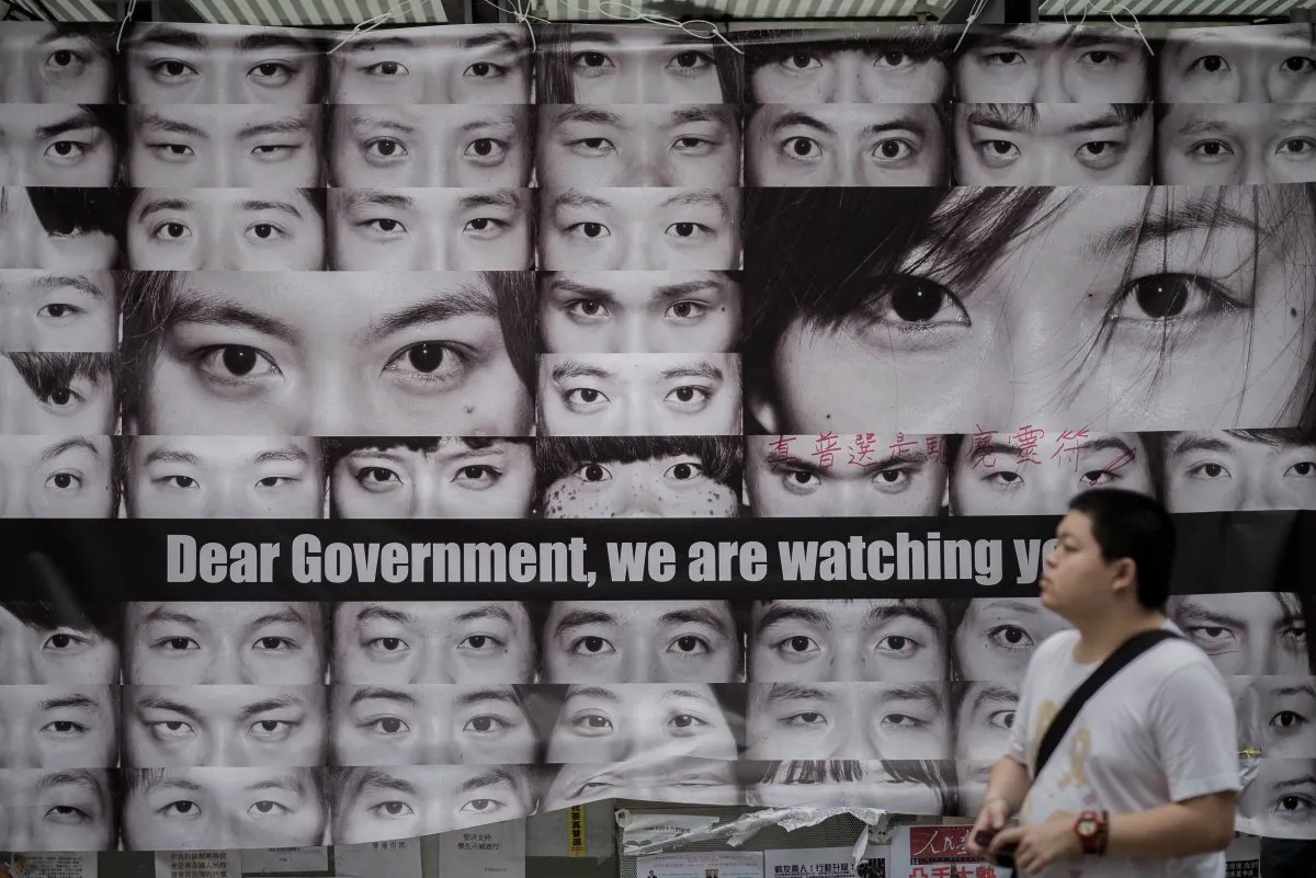 Posters showing pictures of the eyes of pro-democracy protesters are displayed in the Admiralty district of Hong Kong on Nov 11, 2014. (Philippe Lopez/AFP/Getty Images)