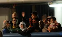 As Asylum-Seekers Flood In, Germany Struggles to House Them