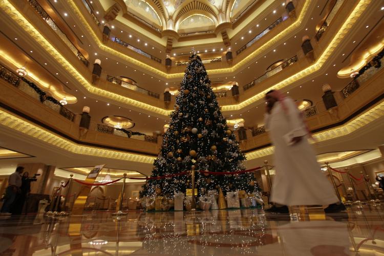 The 11-million-dollar Christmas tree at the Emirates Palace hotel in the Emirati capital Abu Dhabi on December 15. (AFP/Getty Images) The 11-million-dollar Christmas tree at the Emirates Palace hotel in the Emirati capital Abu Dhabi on December 15. (AFP/Getty Images)