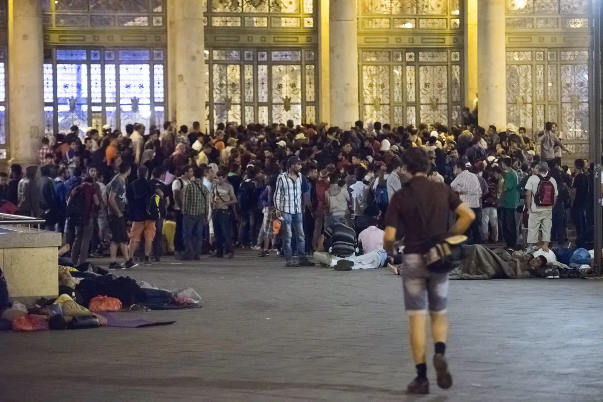 Migrants wait to board a train to Germany at the Keleti Railway Station in Budapest, Hungary, Tuesday morning, Sept 1, 2015. (Zoltan Balogh/MTI via AP)