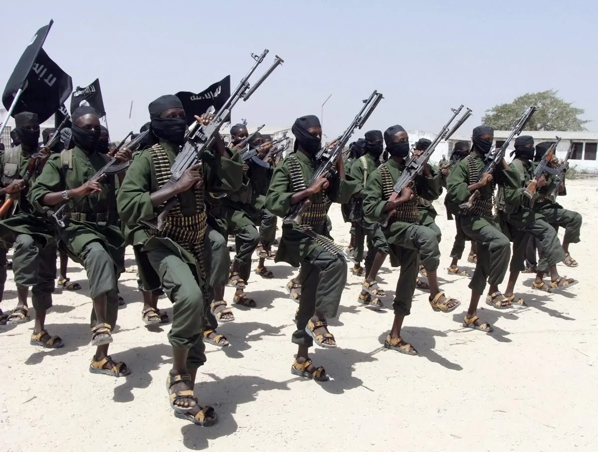 In this Thursday, Feb. 17, 2011 file photo, hundreds of newly trained al-Shabab fighters perform military exercises in the Lafofe area some 18 km south of Mogadishu, in Somalia. (AP Photo/Farah Abdi Warsameh)