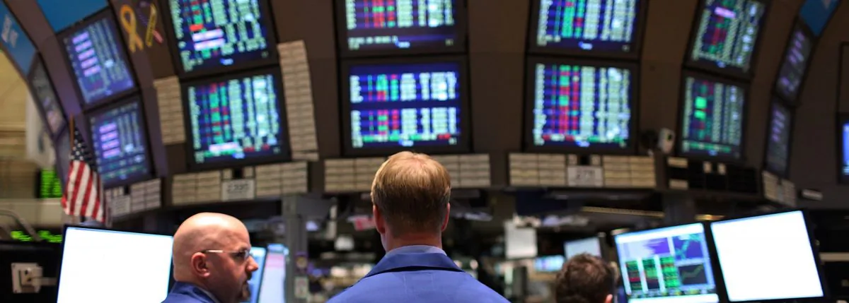 Traders work on the floor of the New York Stock Exchange moments before the closing bell. (Spencer Platt/Getty Images)